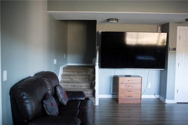 living room featuring dark hardwood / wood-style flooring