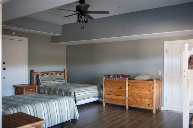 bedroom featuring ceiling fan and dark hardwood / wood-style flooring