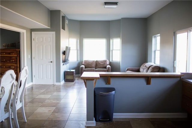 living room featuring light tile patterned floors