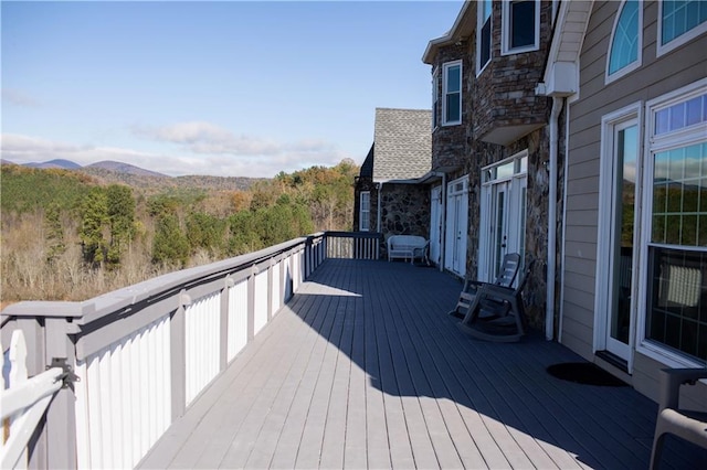 wooden terrace featuring a mountain view