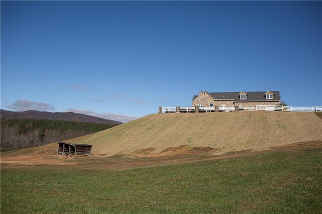 exterior space featuring a mountain view and a rural view