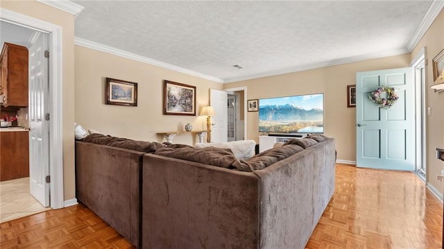 living area featuring a wealth of natural light, a textured ceiling, crown molding, and baseboards