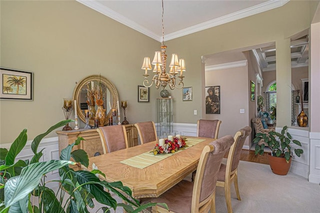 carpeted dining room with an inviting chandelier and crown molding
