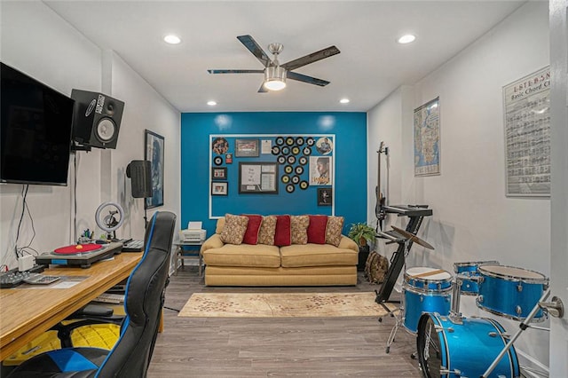 office space featuring wood finished floors, ceiling fan, and recessed lighting