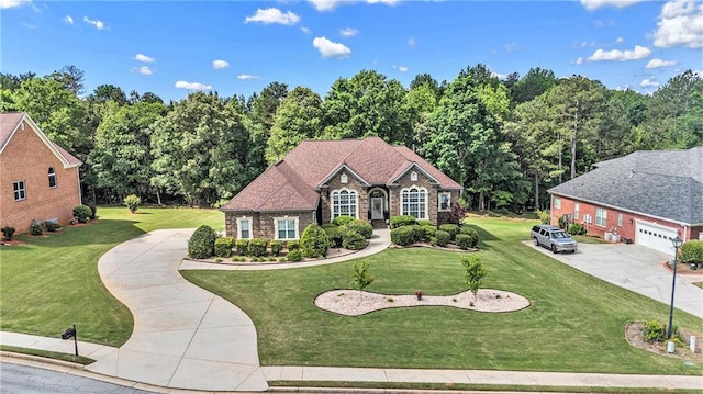 view of front of property with a front lawn and driveway