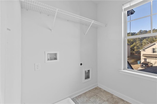 laundry room with a healthy amount of sunlight, electric dryer hookup, and washer hookup