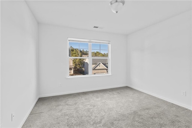 unfurnished room with carpet flooring