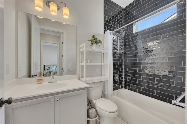 bathroom featuring shower / bath combo with shower curtain, vanity, and toilet