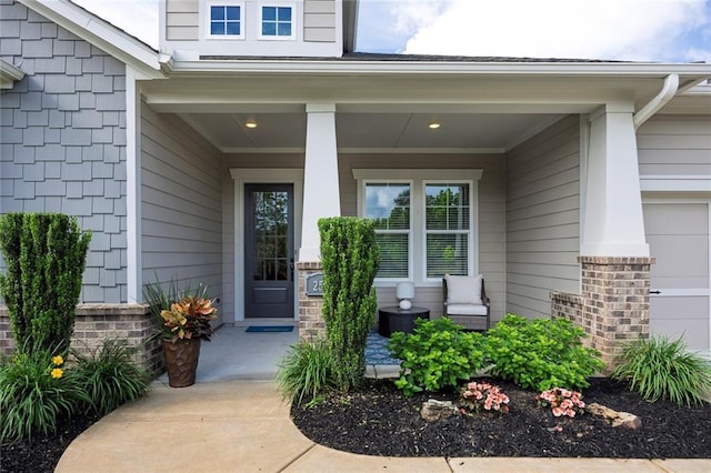 doorway to property featuring a porch