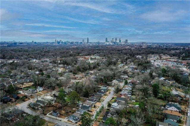 birds eye view of property with a view of city