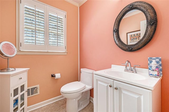 half bathroom featuring baseboards, visible vents, toilet, ornamental molding, and vanity