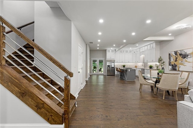 interior space featuring dark wood-type flooring and sink