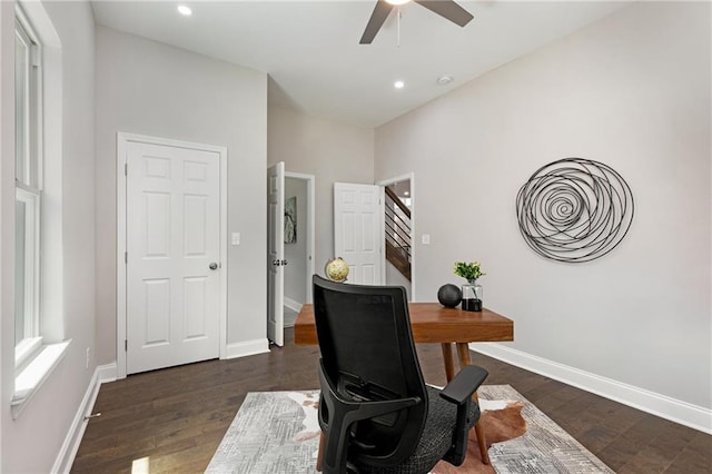 office area featuring ceiling fan and dark hardwood / wood-style flooring