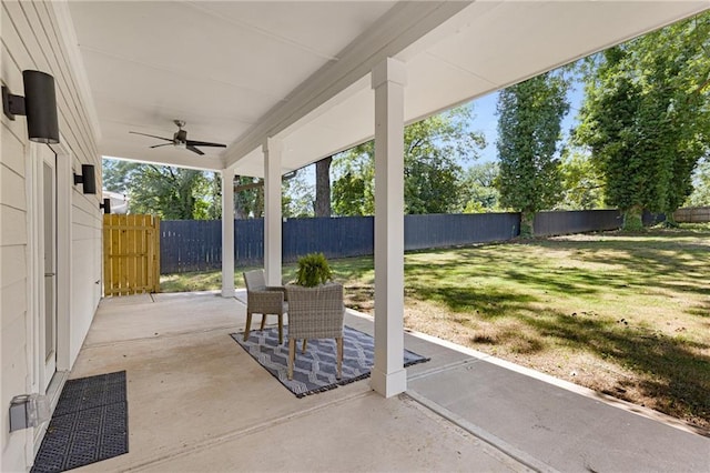 view of patio featuring ceiling fan