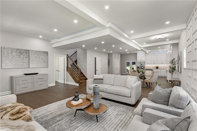 living room with dark hardwood / wood-style flooring