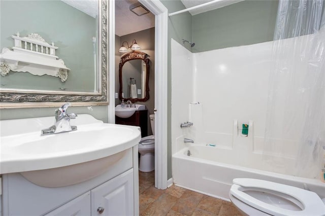 full bath with toilet, shower / tub combo, and vanity