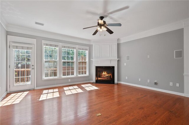 1530 Wehunt Cir SE Unit 19, Smyrna, GA 30082 - unfurnished living room with crown molding, wood finished floors, a ceiling fan, and baseboards