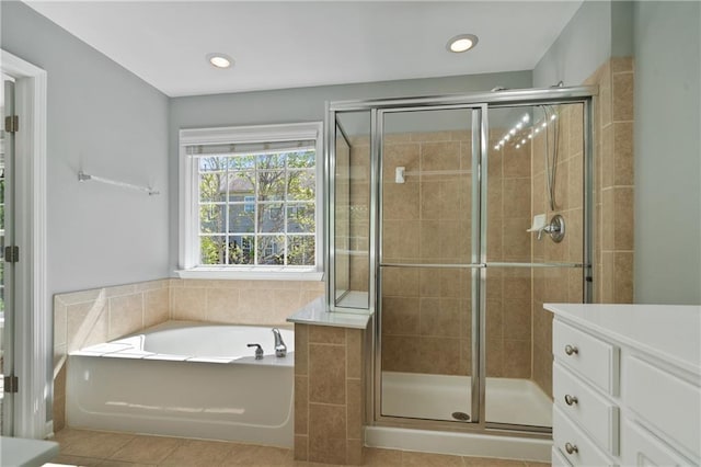 1530 Wehunt Cir SE Unit 19, Smyrna, GA 30082 - full bathroom featuring a shower stall, a garden tub, tile patterned flooring, and recessed lighting
