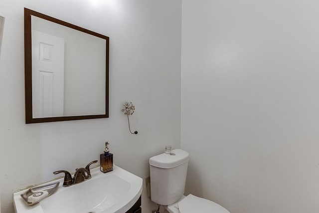 1045 Legacy Walk, Woodstock, GA 30189 - half bath featuring a sink and toilet