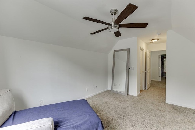 1045 Legacy Walk, Woodstock, GA 30189 - unfurnished bedroom featuring vaulted ceiling, carpet, baseboards, and ceiling fan