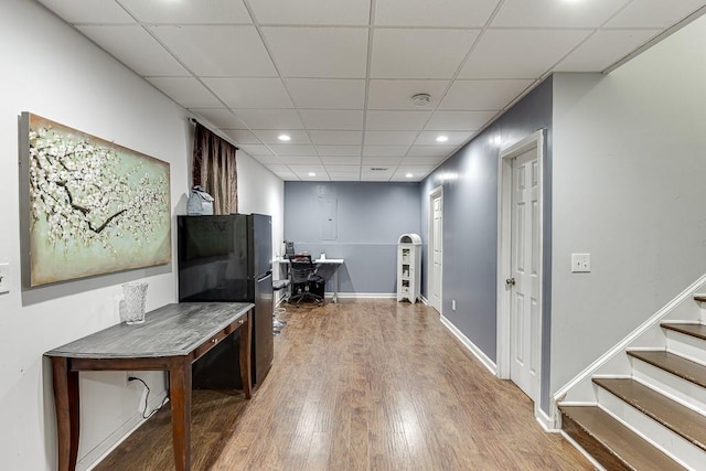 1045 Legacy Walk, Woodstock, GA 30189 - interior space featuring wood finished floors, recessed lighting, a paneled ceiling, and baseboards