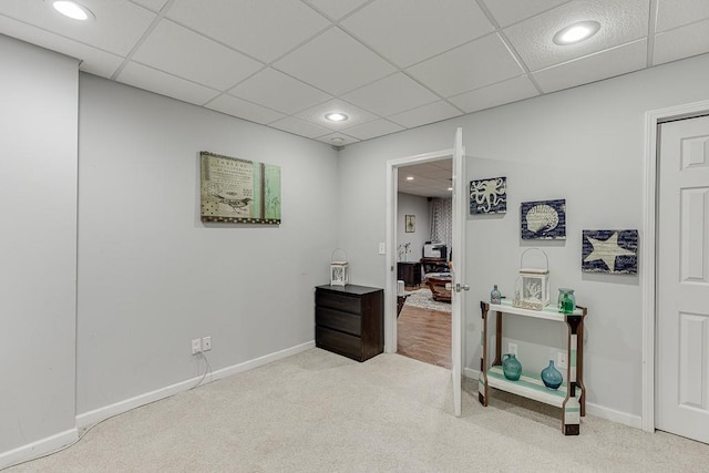 1045 Legacy Walk, Woodstock, GA 30189 - hall with a desk, carpet floors, a paneled ceiling, recessed lighting, and baseboards