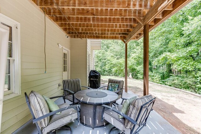 1045 Legacy Walk, Woodstock, GA 30189 - aerial perspective of suburban area featuring a heavily wooded area