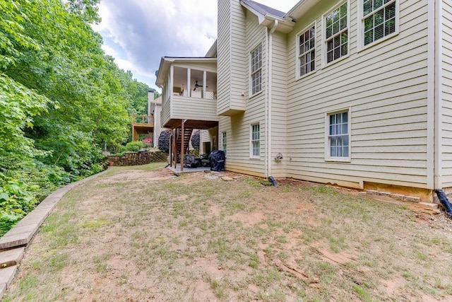 1045 Legacy Walk, Woodstock, GA 30189 - rear view of property featuring a ceiling fan and a patio
