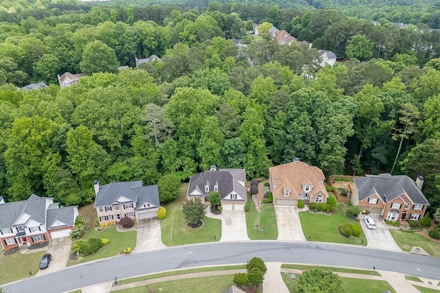 1045 Legacy Walk, Woodstock, GA 30189 - aerial perspective of suburban area featuring a heavily wooded area