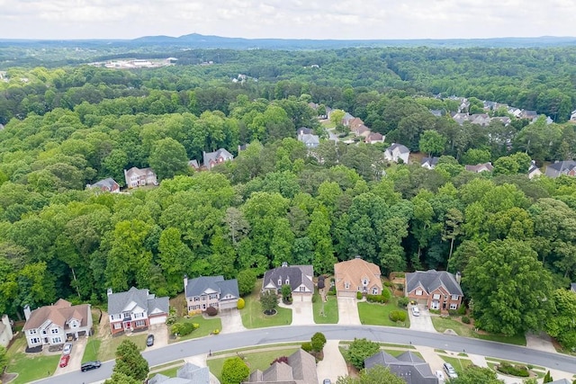 1045 Legacy Walk, Woodstock, GA 30189 - aerial view of residential area featuring a heavily wooded area