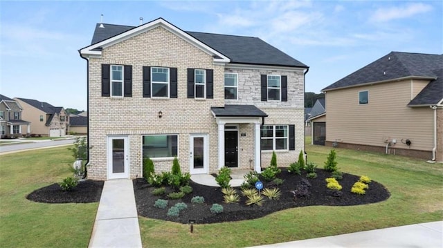 view of front of home featuring a front yard