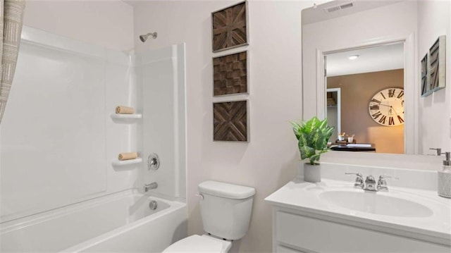 full bathroom with shower / bathing tub combination, vanity, and toilet