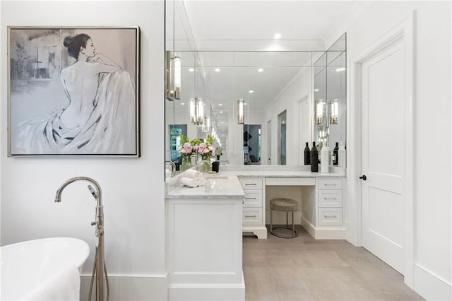 bathroom featuring vanity and a tub to relax in