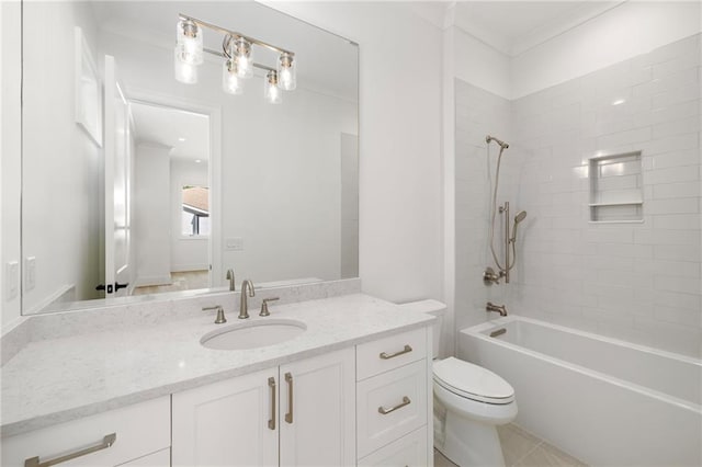 full bathroom featuring tile patterned flooring, vanity, toilet, and tiled shower / bath