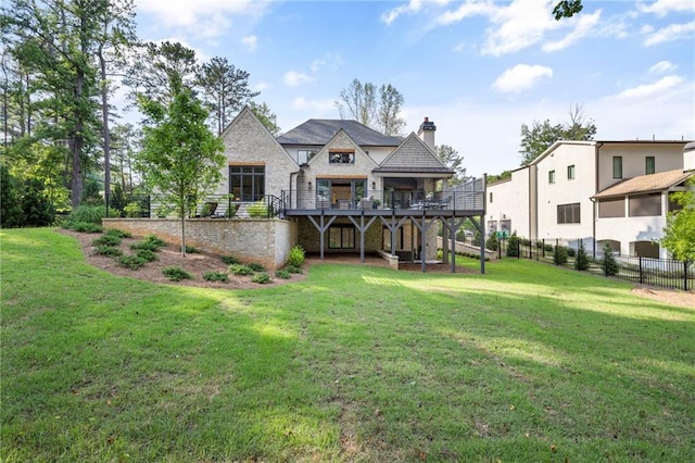 exterior space with a yard and a wooden deck