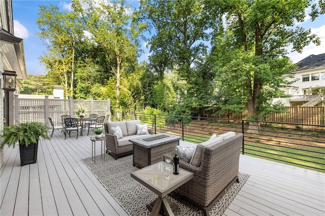 deck featuring outdoor lounge area