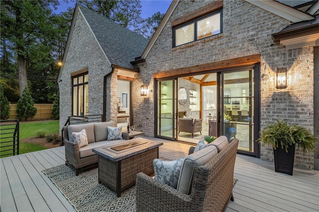 wooden deck featuring an outdoor hangout area