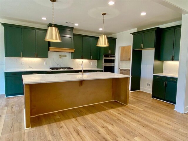 9224 Waldrip Rd, Gainesville, GA 30506 - kitchen featuring green cabinetry, light wood-style flooring, stainless steel appliances, a sink, and decorative backsplash