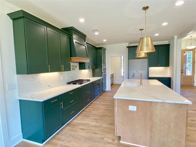 9224 Waldrip Rd, Gainesville, GA 30506 - kitchen with green cabinetry, light wood-style flooring, a sink, tasteful backsplash, and recessed lighting