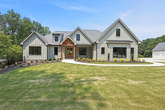 9224 Waldrip Rd, Gainesville, GA 30506 - modern farmhouse style home featuring board and batten siding, a shingled roof, and a standing seam roof