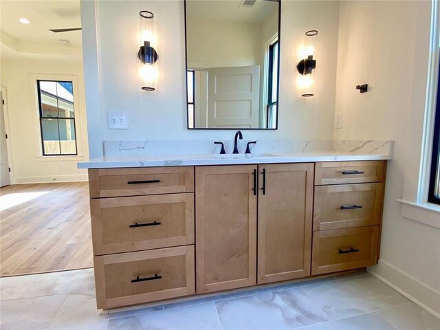 9224 Waldrip Rd, Gainesville, GA 30506 - bathroom with baseboards, vanity, and ceiling fan