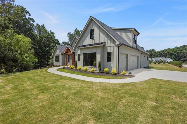 9224 Waldrip Rd, Gainesville, GA 30506 - view of front of home featuring board and batten siding, a garage, driveway, and a front lawn