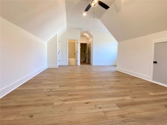 9224 Waldrip Rd, Gainesville, GA 30506 - bonus room featuring a ceiling fan, vaulted ceiling, baseboards, and light wood-type flooring