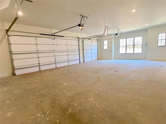 9224 Waldrip Rd, Gainesville, GA 30506 - garage with a garage door opener and recessed lighting