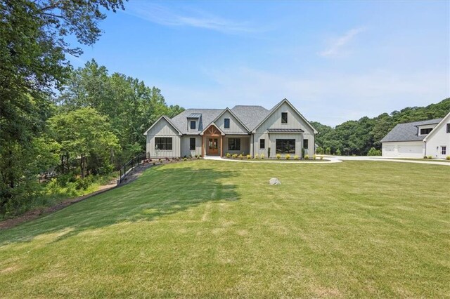 9224 Waldrip Rd, Gainesville, GA 30506 - modern inspired farmhouse featuring board and batten siding and a front yard