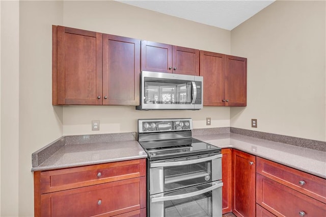 kitchen with light countertops and stainless steel appliances