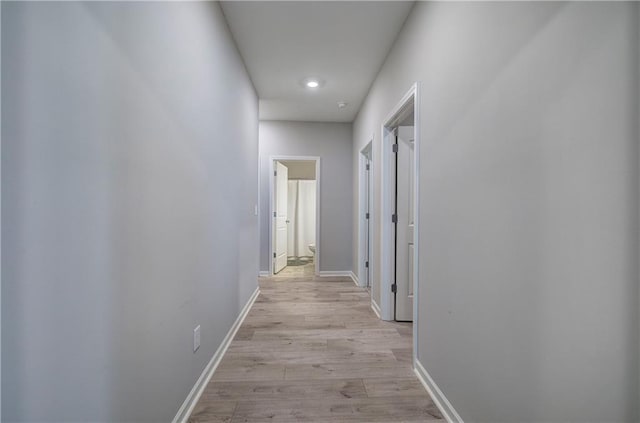 hallway featuring light wood-type flooring