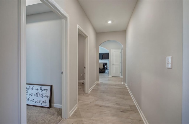 hall featuring light hardwood / wood-style flooring