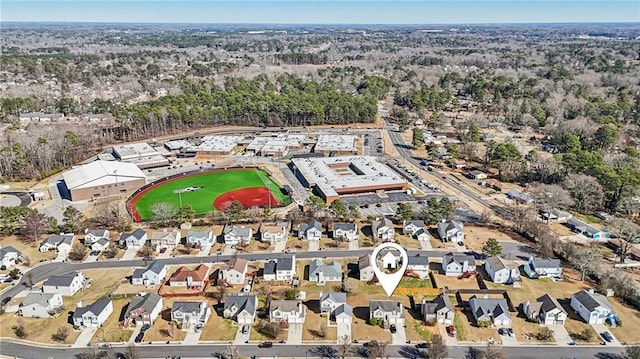 birds eye view of property with a residential view