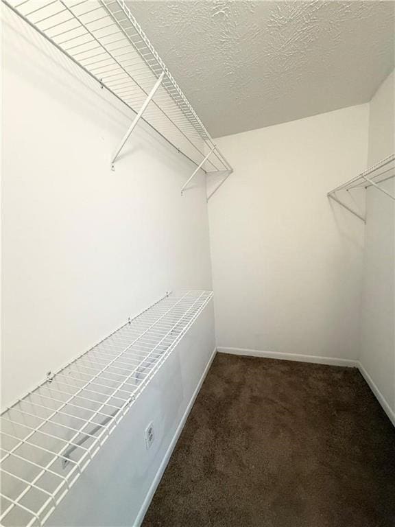 296 Country Club Dr, Jonesboro, GA 30238 - spacious closet featuring carpet